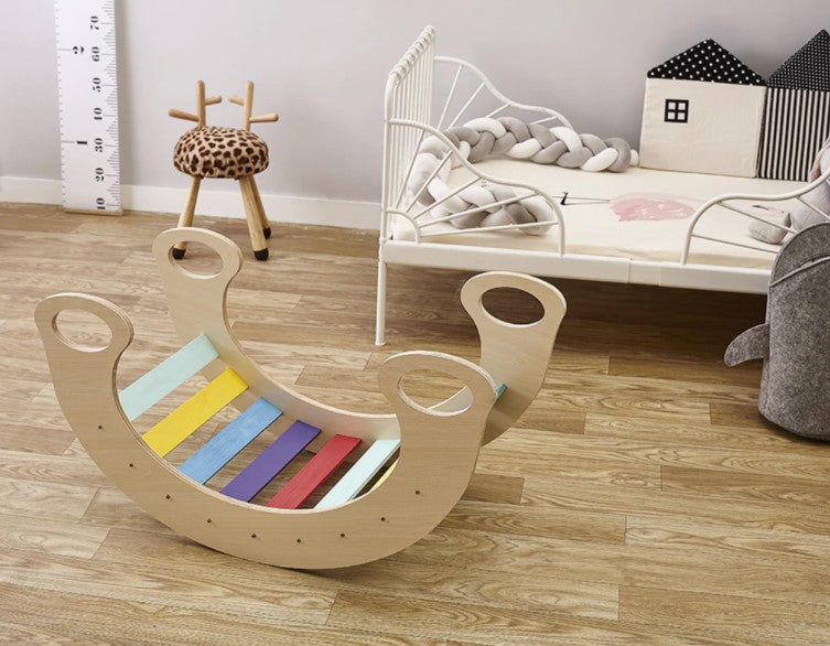 Cama mecedora de madera para niños