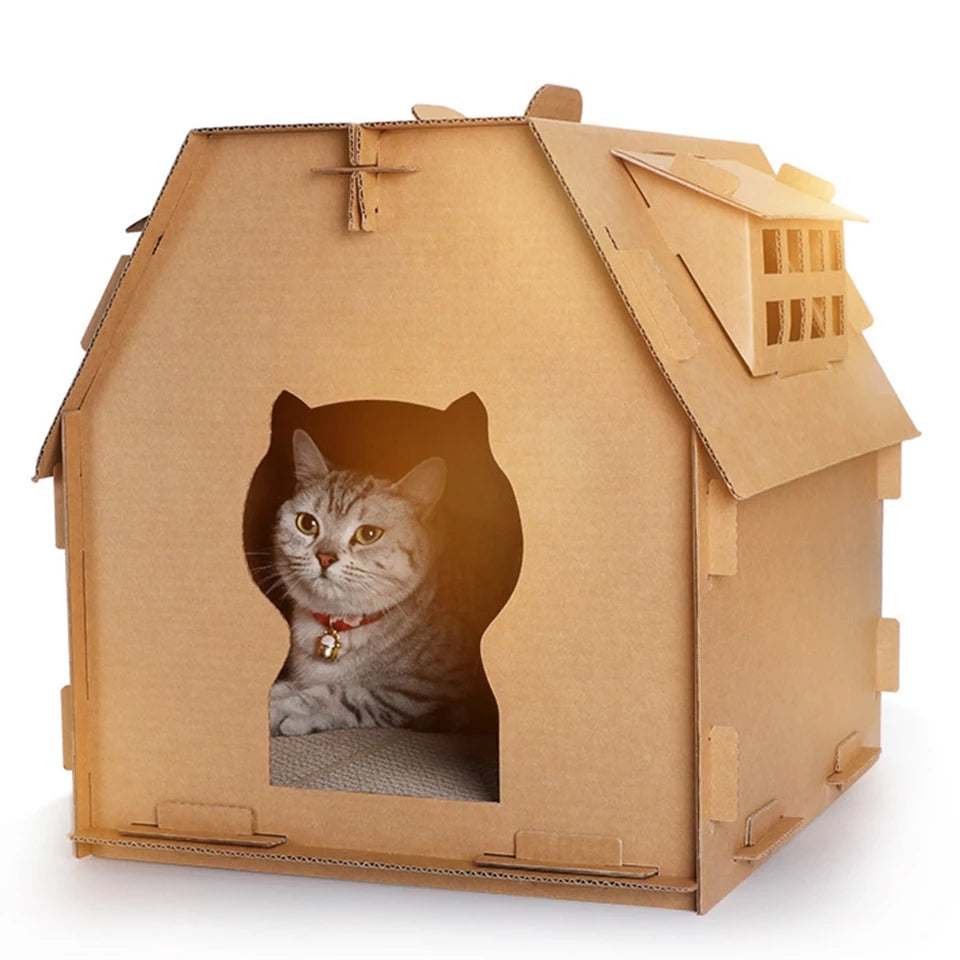 una casa para gatos hecho con carton