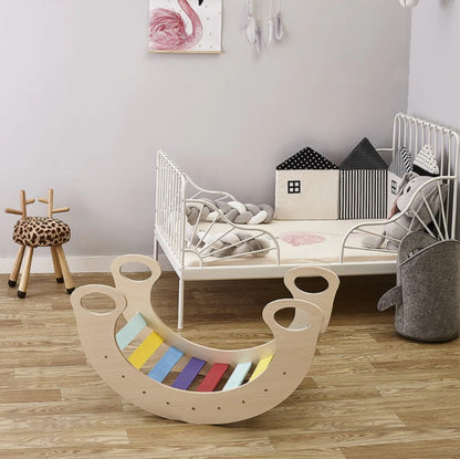 Cama mecedora de madera para niños